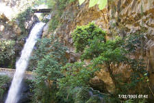 Waterfal with walkway behind