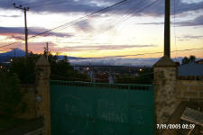 Front gate; morning fog over city